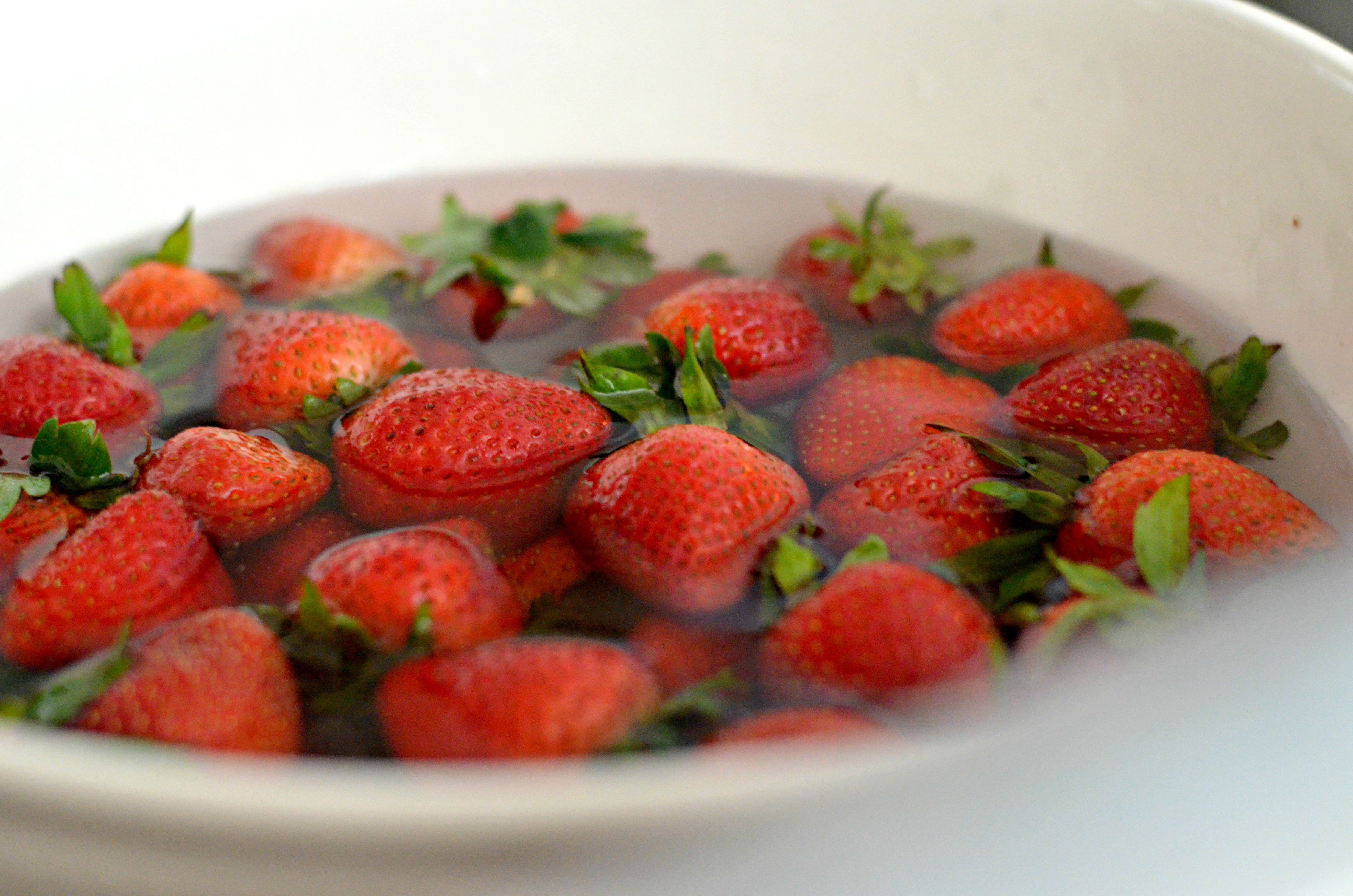 strawberries soaking in vinegar