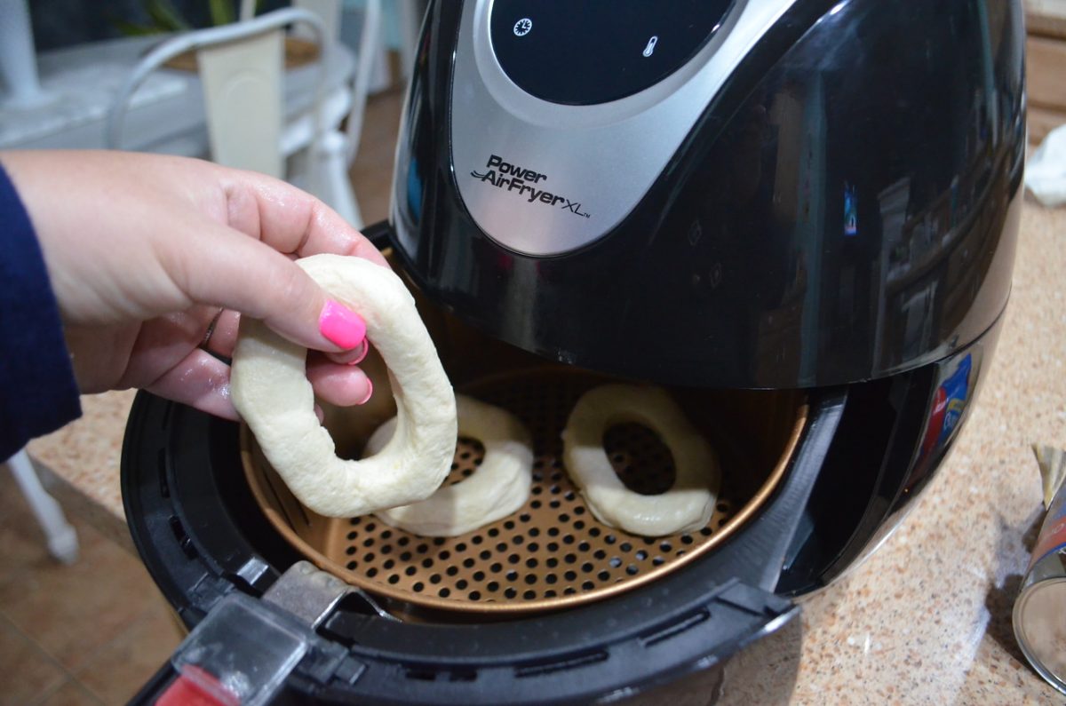 putting donuts into an air fryer