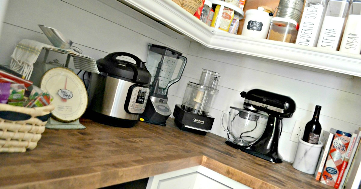 kitchen appliances on a pantry shelf