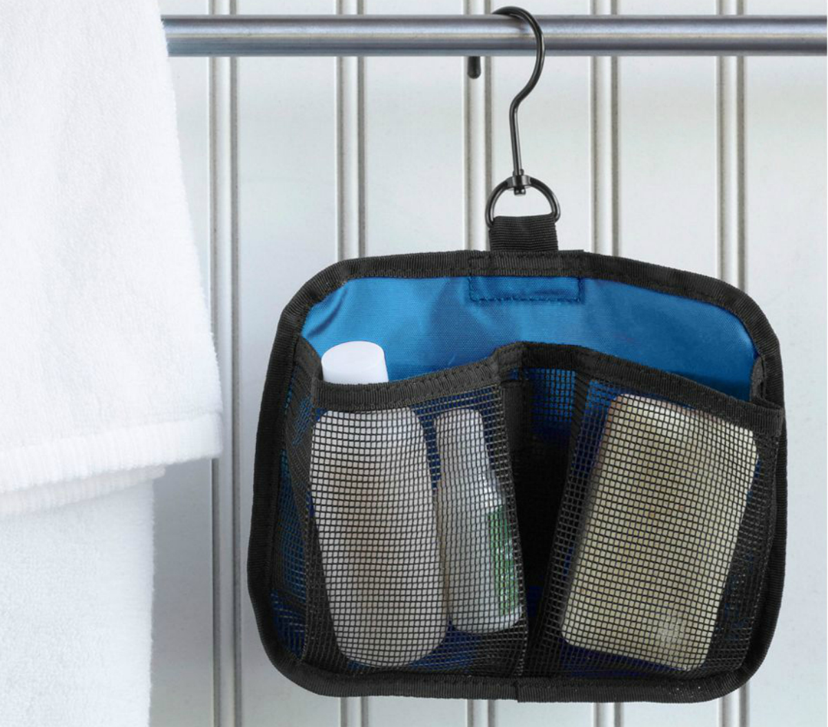 travel organizer hanging from a shower curtain rod