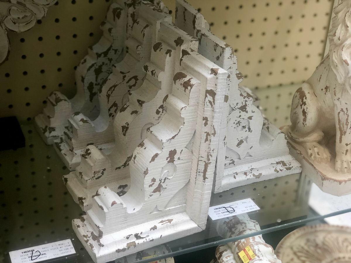 Hobby Lobby Magnolia lookalike Corbel bookends display with the deal in the store