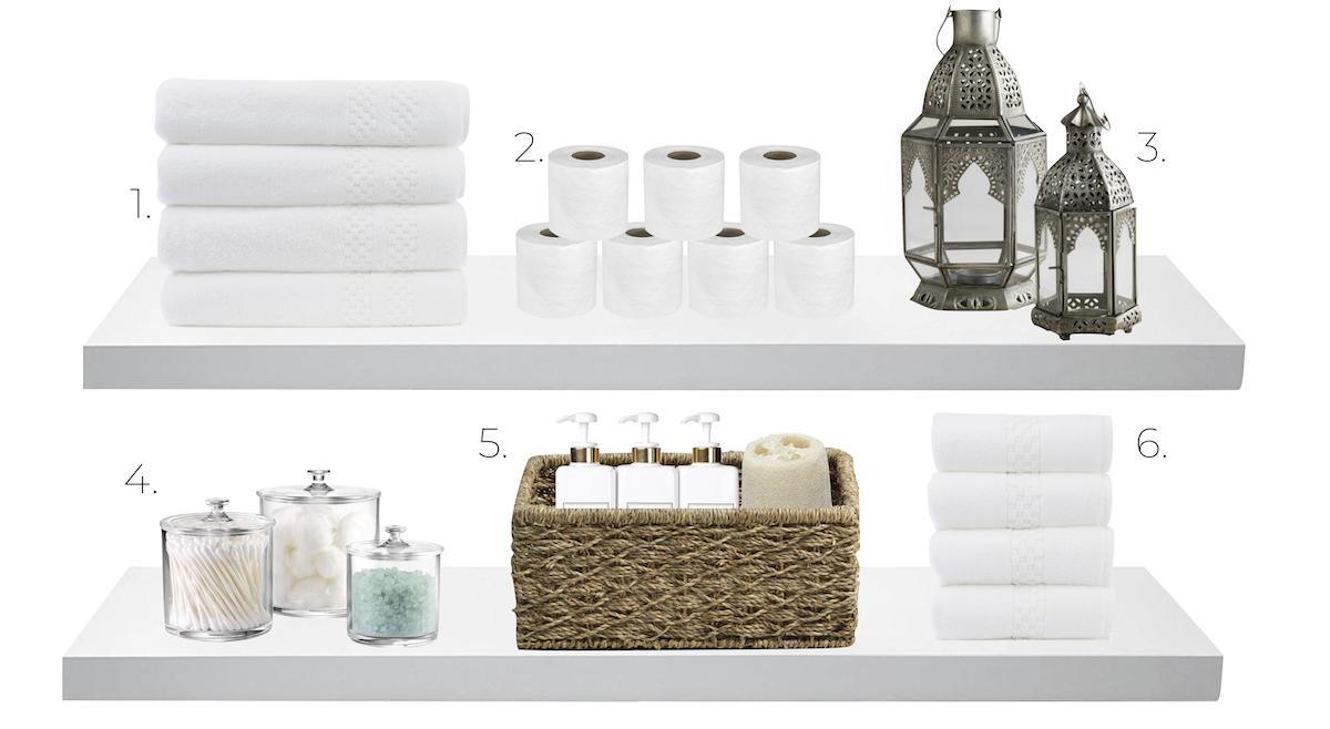 bathroom accessories on shelves – towels, toilet paper, lanterns, apothecary jars, bath items
