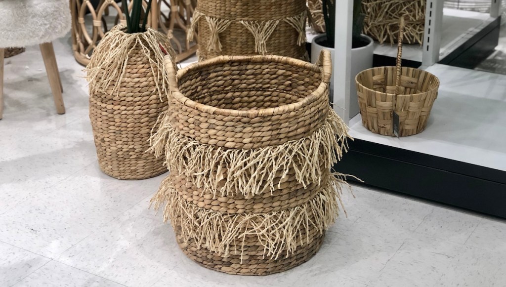 natural colored fringe basket on floor