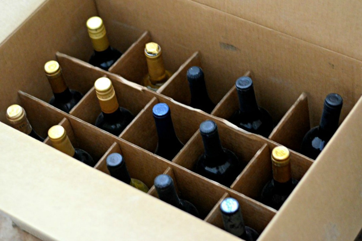 bottles separated in an open cardboard box