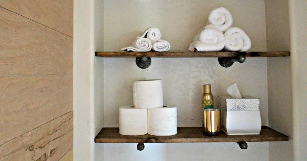 industrial shelves with various bathroom accessories and essentials