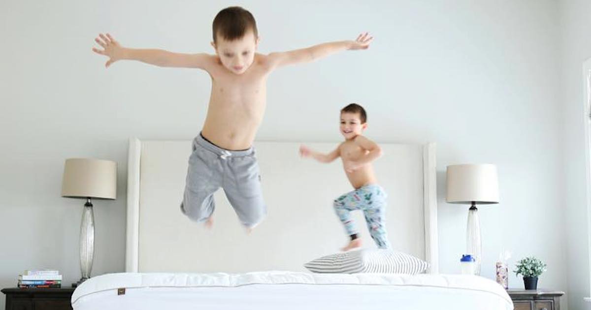 how often do you clean your bed - boys jumping on mattress