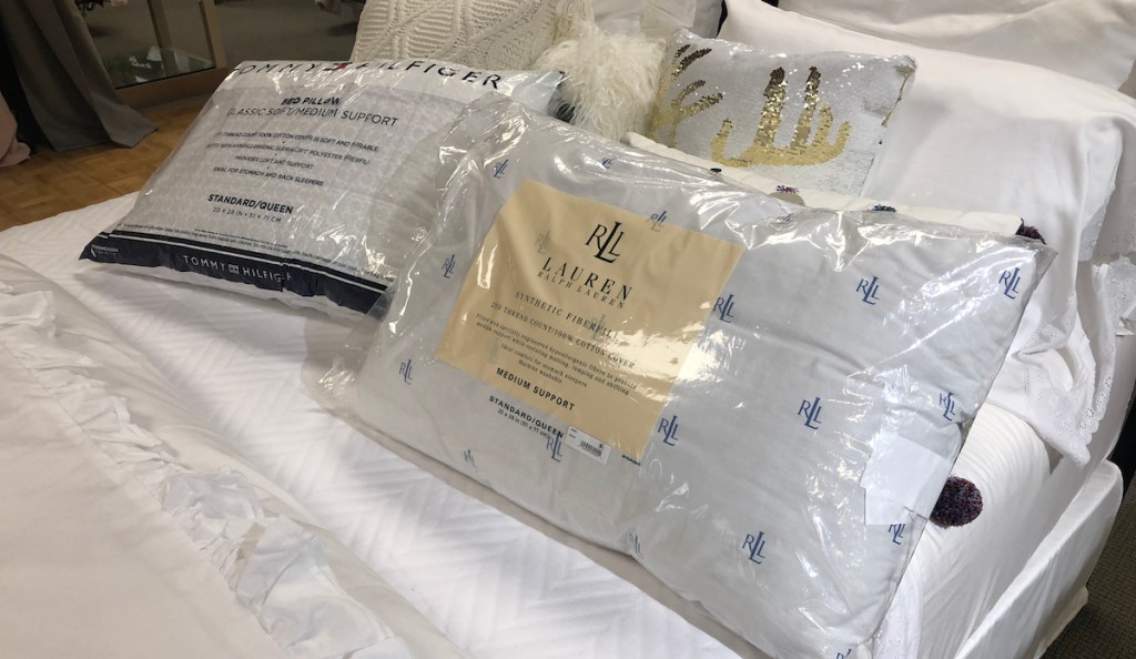 ralph lauren pillows on bed in packaging