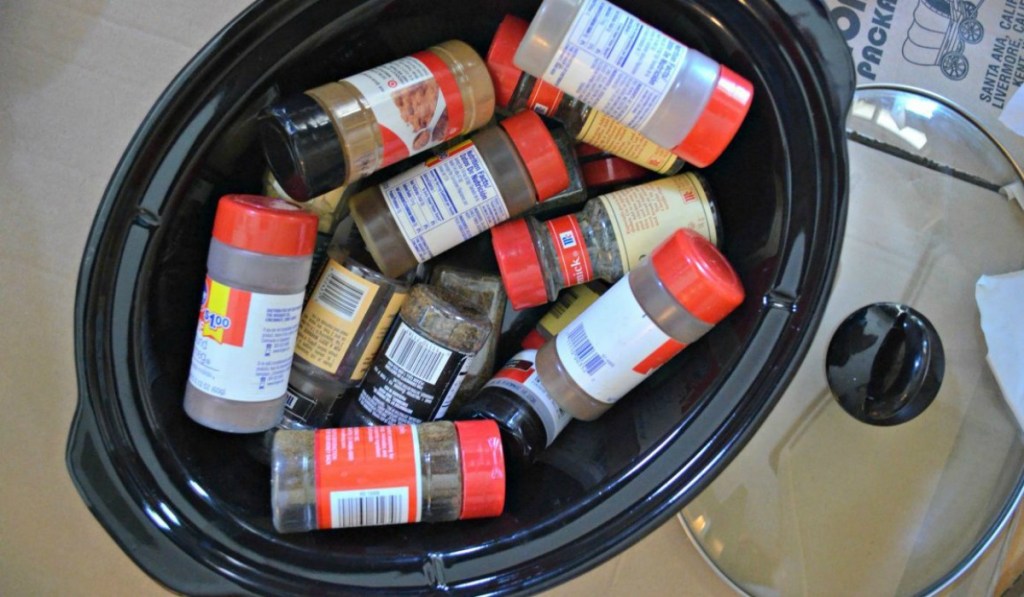 spices stored in slow cooker for moving