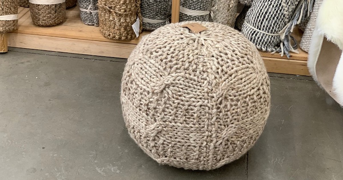 taupe beige sweater knit ottoman footstool sitting on the floor
