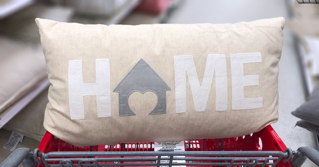 target pillows — cream lumbar pillow that spells out "home"