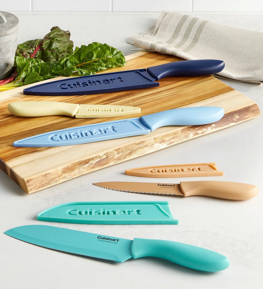 Cuisinart colorful ceramic cutlery set on cutting board 