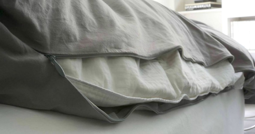 zipping up grey duvet cover insert 