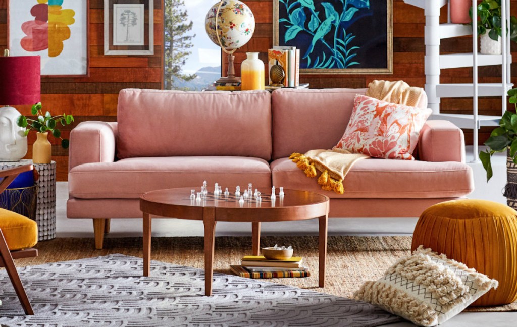 pink living room with sofa and other decor