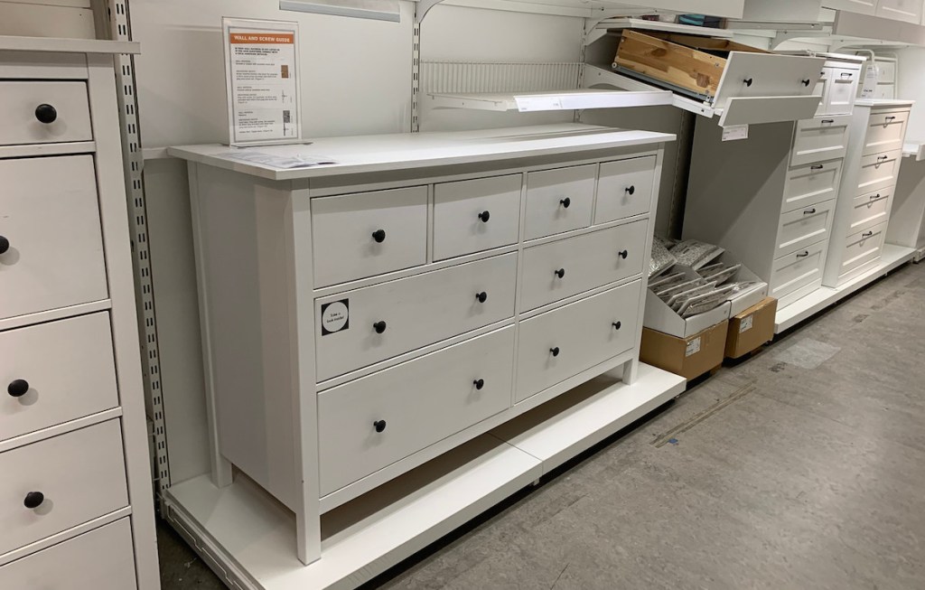 8 drawer dresser white with black knobs in showroom