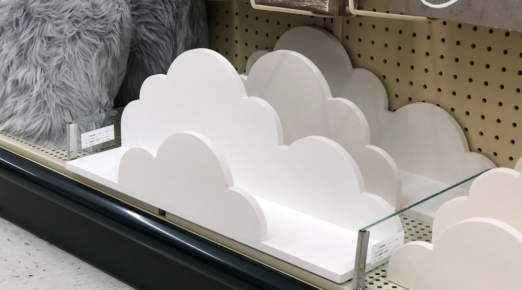 white wood cloud shaped shelves wall decor sitting on store shelf