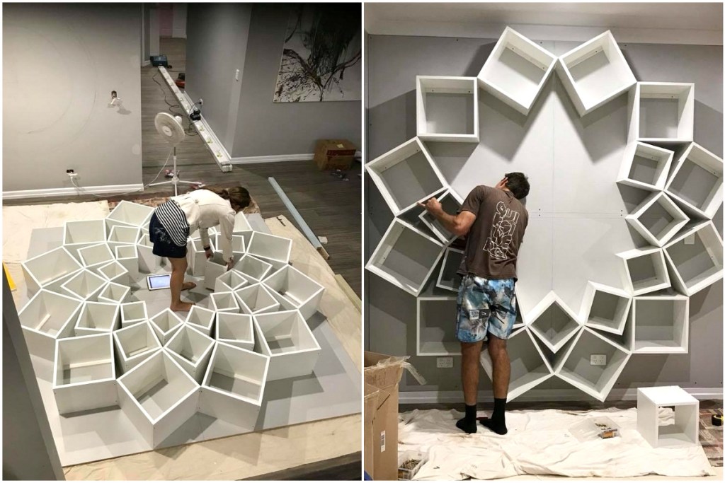 couple building unique wall shelf