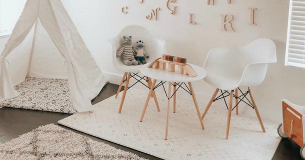 mid-mod white chairs in play room 