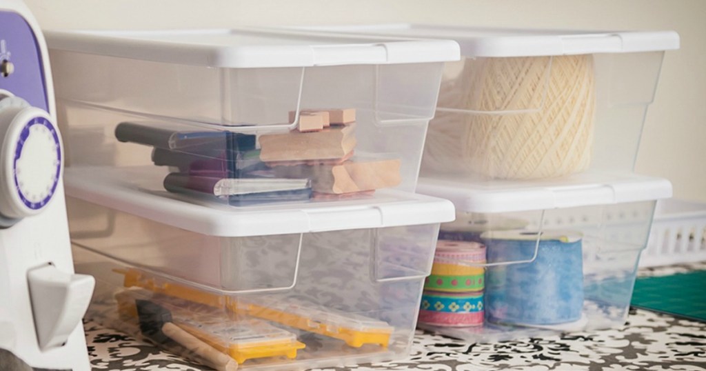 Sterilite storage bins with supplies 