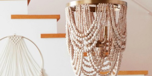 Buy This Bohemian Wood Bead Light for Almost Half the Cost of Pottery Barn’s