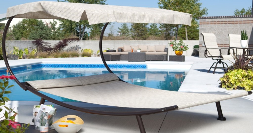 double Chaise lounge bed by pool
