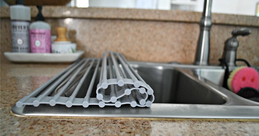 easy roll-up drying rack on the kitchen sink 