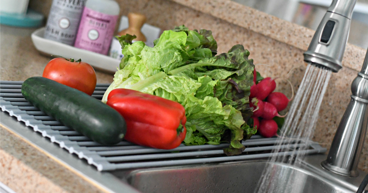 sink drying mat with produce on top 