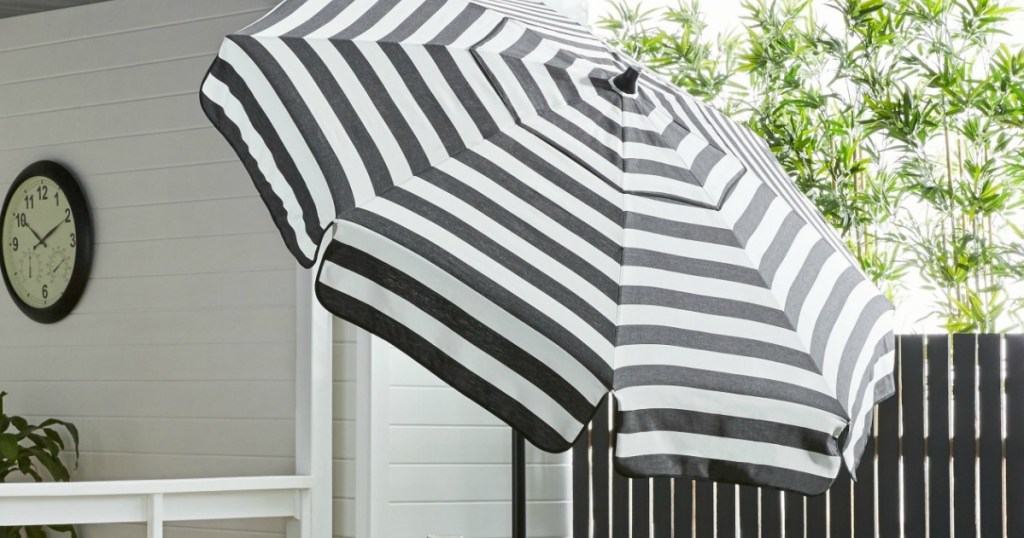 black & white striped umbrella in backyard