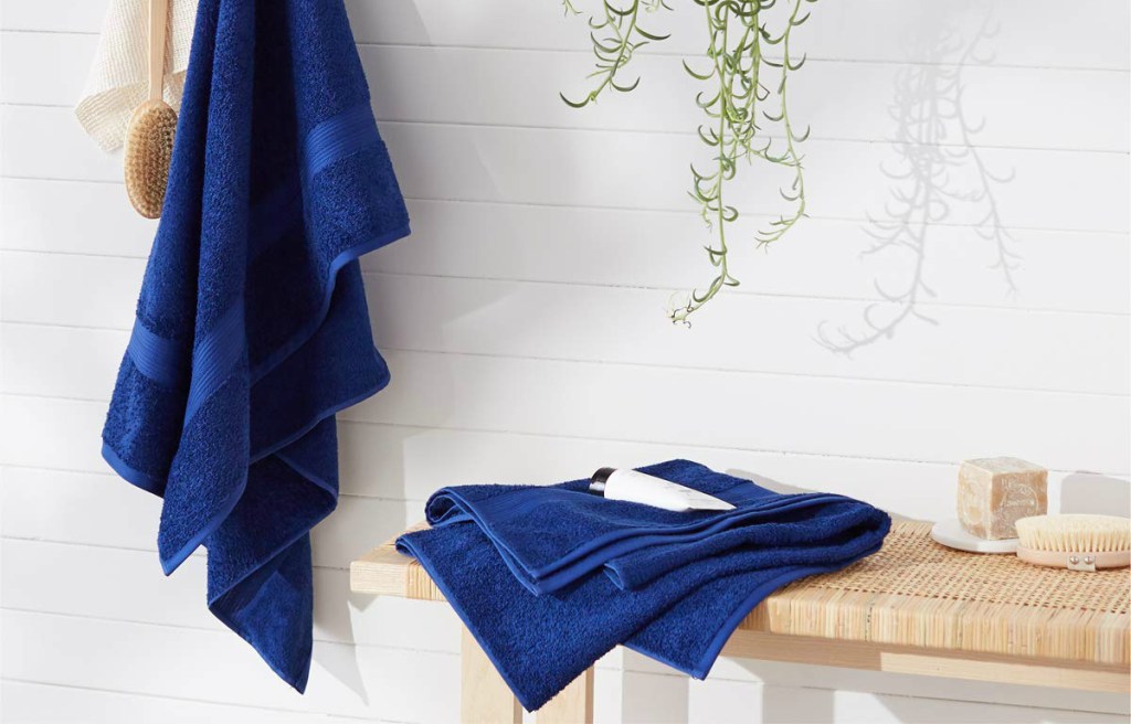 blue bath towels in bathroom