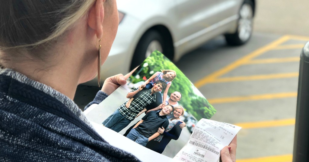 Collin holding walgreens photo of family