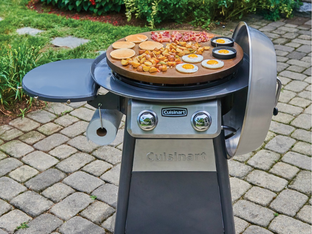 Cuisinart cooking center with various foods cooking on the griddle surface