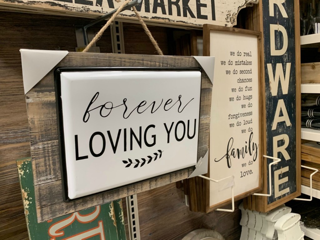 wooden plaque with ceramic forever loving you sign