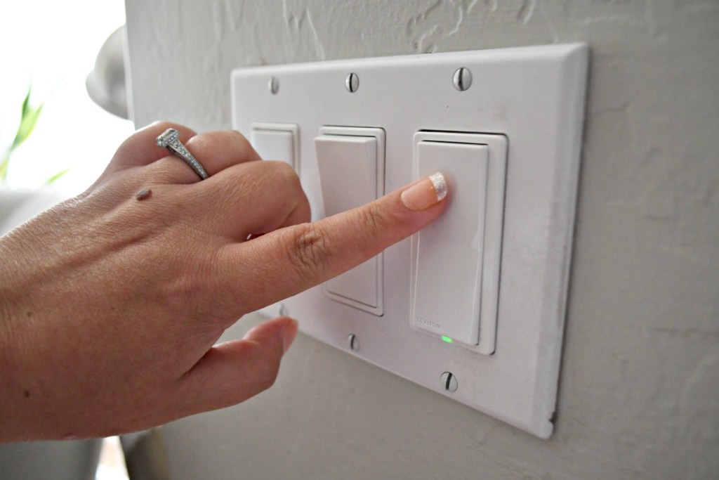 turning on a Leviton wifi smart light switch