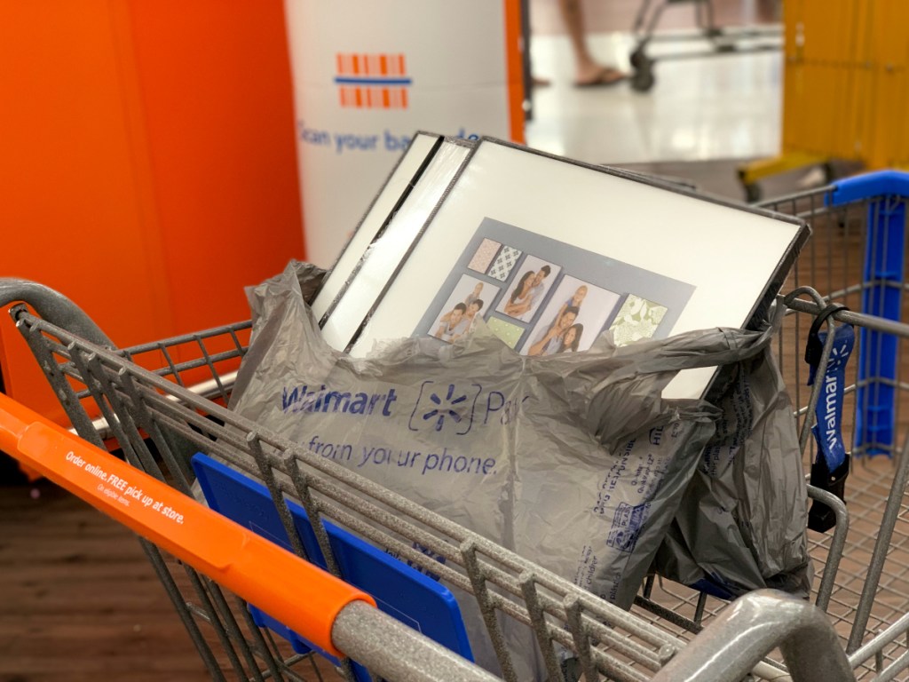 Walmart cart with Mainstays picture frames