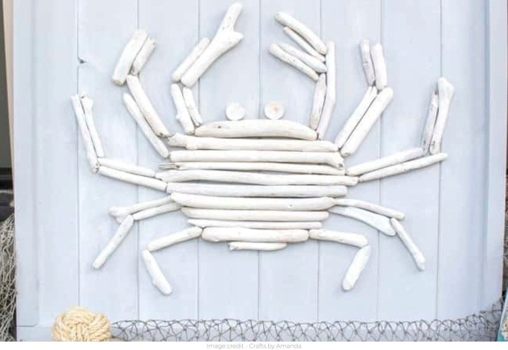 white driftwood crab on wood pallet frame