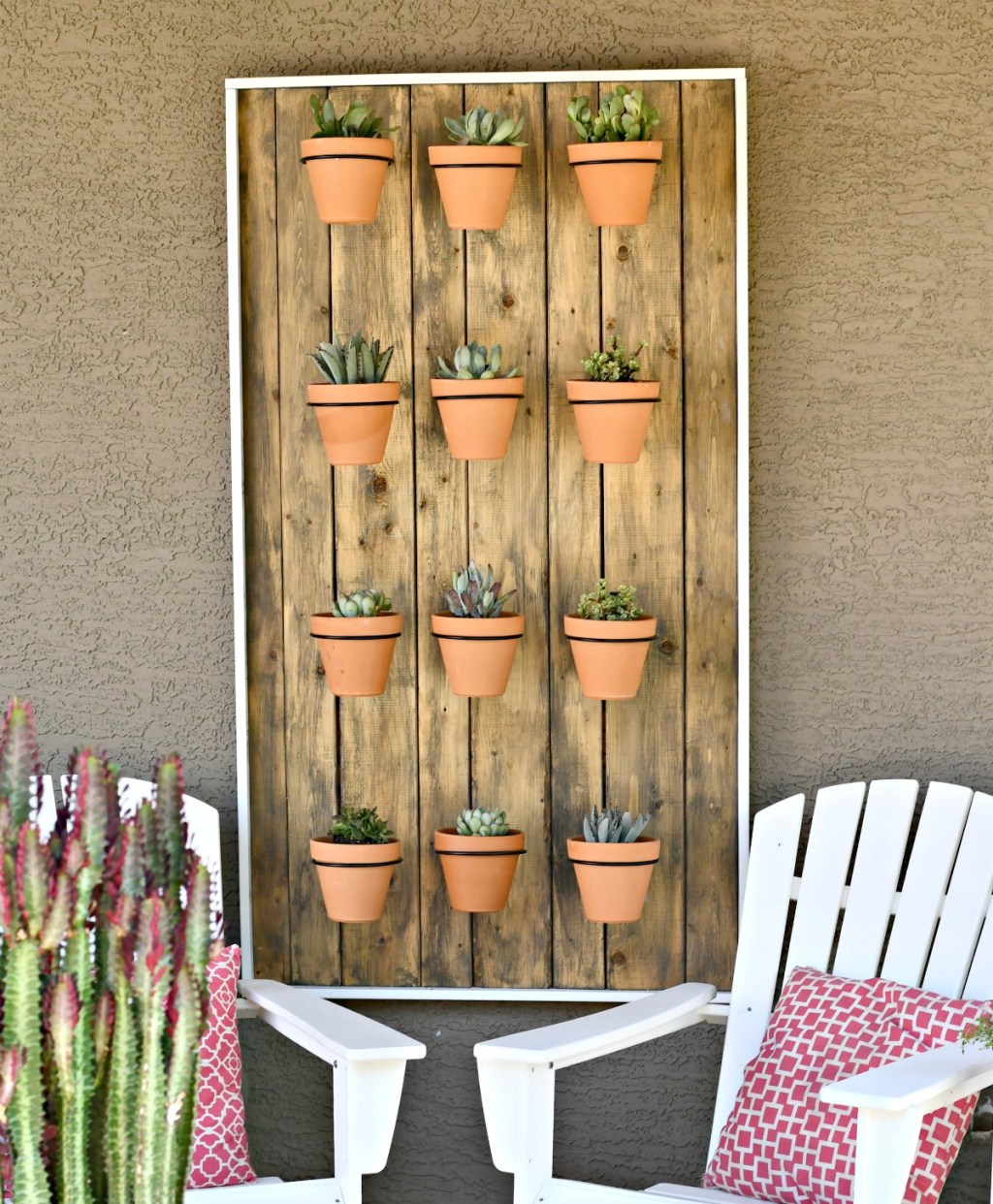 hanging potted wall of succulents