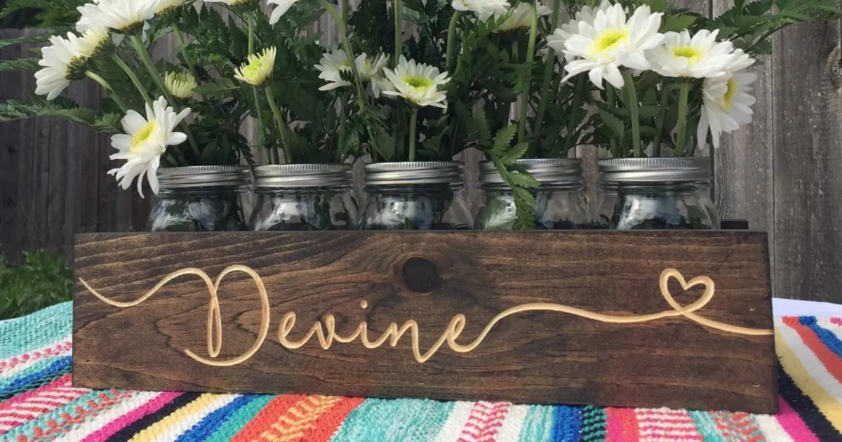 mason jar wood centerpiece with flowers 