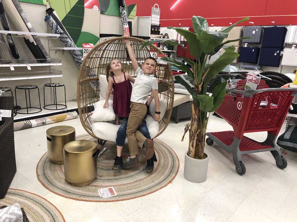 kids playing in egg chair at Target