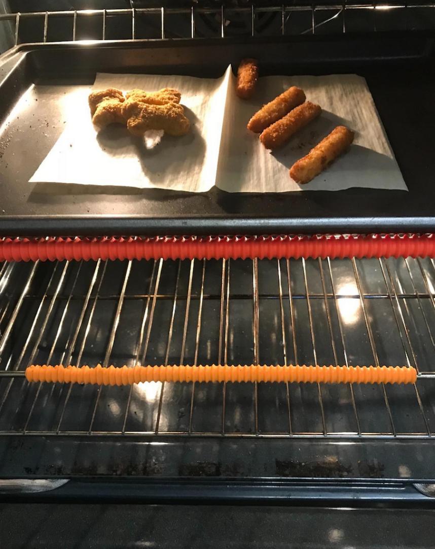 oevn rack protectors with chicken nuggets and fish sticks baking 