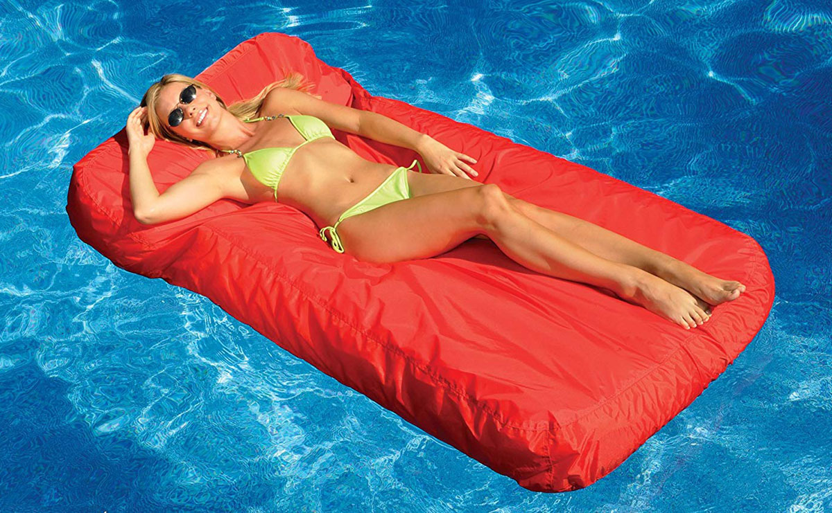 lady on bean bag pool float in pool 