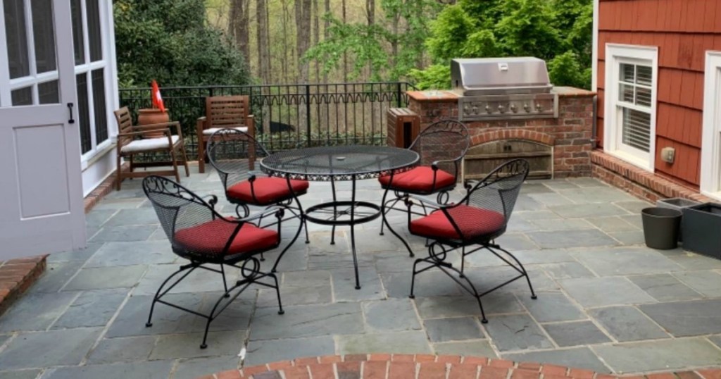 wrought iron patio set with red cushions 