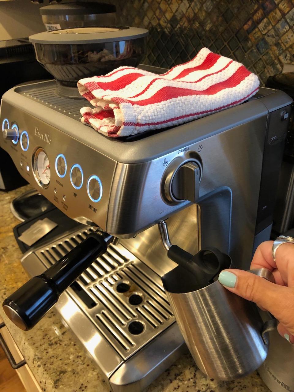 frothing milk with Breville espresso machine 