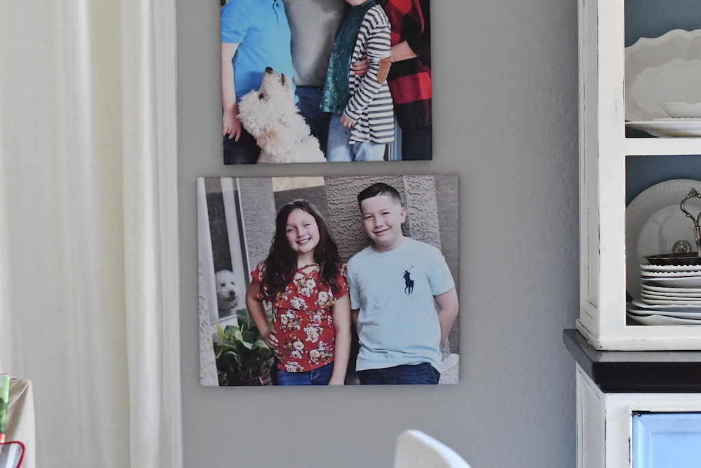 canvas photo prints hanging in dining room 