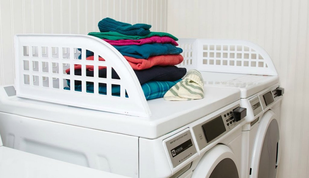 white laundry guard on top of washer dryer