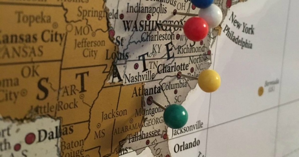 scratch off map with pins in states 