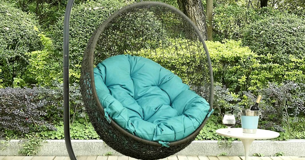 Mercury Row Valletta Swing Chair with Stand with turquoise cushion