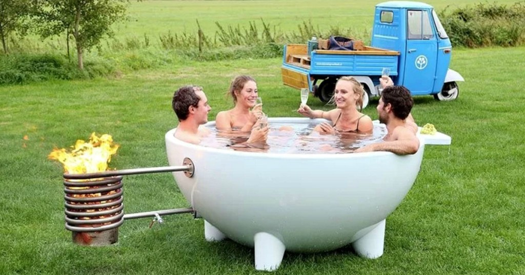 people sitting in outdoor hot tub