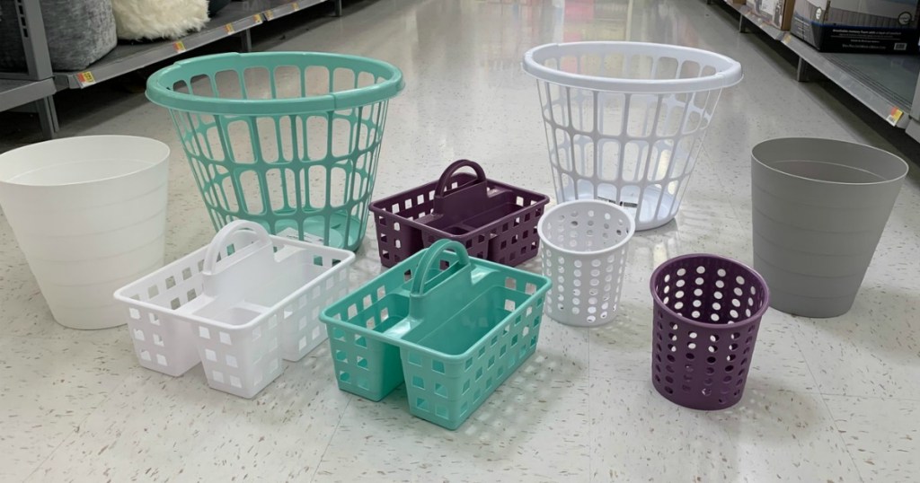 Variety of Walmart Storage containers on floor in store