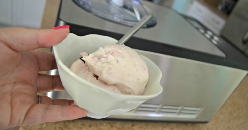 holding ice cream in a bowl in front of Whynter ice cream maker 