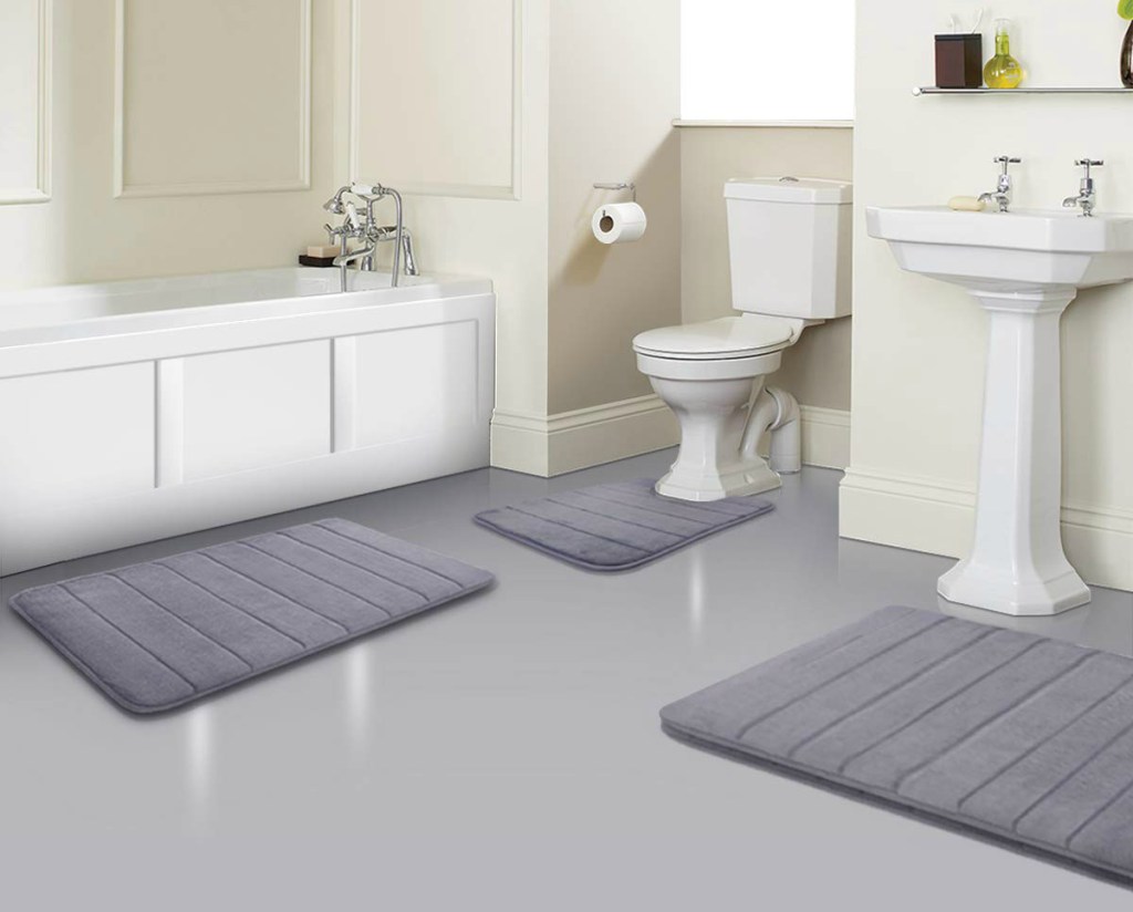 bathroom with gray bath mats
