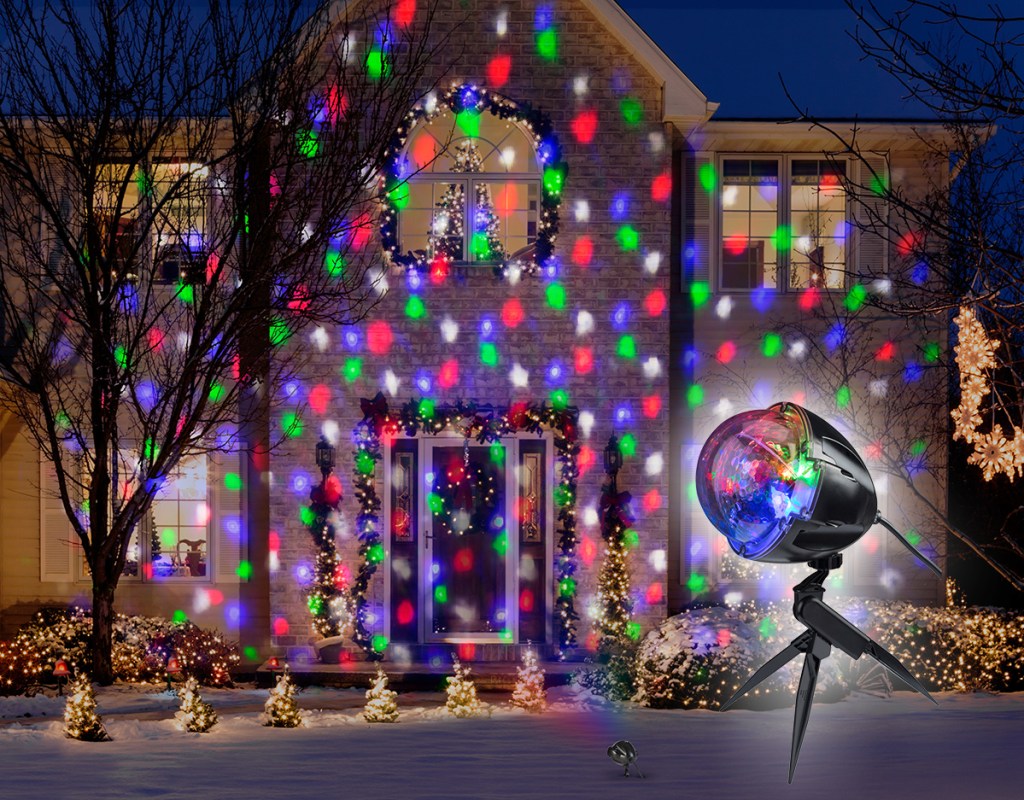 christmas light projector with lights on house